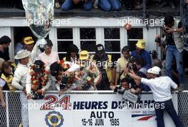 Klaus Ludwig (GER) Paolo Barilla (ITA) John Winter (GER) Porsche 956B Turbo Cl C1 New Man Joest Racing 1st position celebrate podium