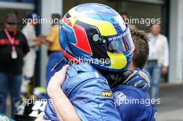 30.05.2004 Estoril, Portugal, Sunday 30 May 2004, Fabrizio Del Monte, ITA, GP Racing, being congratulated by a team member - SUPERFUND EURO 3000 Championship Rd 2, Estoril, Portugal, PRT - SUPERFUND COPYRIGHT FREE editorial use only