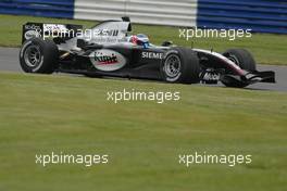 03.06.2004 Silverstone, England, Thursday, June, Kimi Raikkonen, FIN, Räikkönen, McLaren Mercedes, New McLaren MP4-19B ,F1 testing, Silverstone, Great Britain