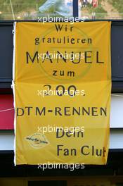 28.08.2005 Zandvoort, The Netherlands,  Fan flag congratulating Manuel Reuter (GER), Opel Performance Center, with his 200th DTM race - DTM 2005 at Circuit Park Zandvoort (Deutsche Tourenwagen Masters)