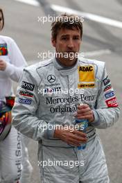 13.04.2008 Hockenheim, Germany,  Bernd Schneider (GER), Team HWA AMG Mercedes, AMG Mercedes C-Klasse walks out of the parc fermé with a very dissapointed face. - DTM 2008 at Hockenheimring