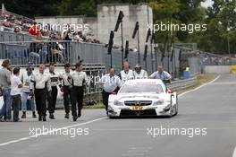 Paul Di Resta (GBR) Mercedes AMG DTM-Team HWA DTM Mercedes AMG C-Coupé comes slow in the pitlane 28.06.2014, Norisring, Nürnberg, Germany, Friday.