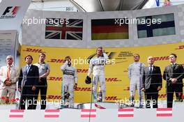 The podium (L to R): Nico Rosberg (GER) Mercedes AMG F1, second; Lewis Hamilton (GBR) Mercedes AMG F1, race winner; Daniel Ricciardo (AUS) Red Bull Racing, third. 22.06.2014. Formula 1 World Championship, Rd 8, Austrian Grand Prix, Spielberg, Austria, Race Day.