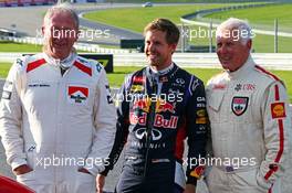 (L to R): Dr Helmut Marko (AUT) Red Bull Motorsport Consultant with Sebastian Vettel (GER) Red Bull Racing. 21.06.2014. Formula 1 World Championship, Rd 8, Austrian Grand Prix, Spielberg, Austria, Qualifying Day.