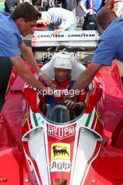 Niki Lauda (AUT) Mercedes Non-Executive Chairman is reunited with his Ferrari 312T2. 21.06.2014. Formula 1 World Championship, Rd 8, Austrian Grand Prix, Spielberg, Austria, Qualifying Day.
