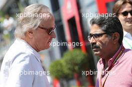 (L to R): Mansour Ojjeh, McLaren shareholder with Muhammed Al Khalifa (BRN) Bahrain Circuit Chairman. 22.06.2014. Formula 1 World Championship, Rd 8, Austrian Grand Prix, Spielberg, Austria, Race Day.