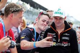 Nico Hulkenberg (GER) Sahara Force India F1 with fans. 19.06.2014. Formula 1 World Championship, Rd 8, Austrian Grand Prix, Spielberg, Austria, Preparation Day.