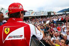 Fernando Alonso (ESP) Ferrari with the fans. 19.06.2014. Formula 1 World Championship, Rd 8, Austrian Grand Prix, Spielberg, Austria, Preparation Day.