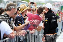 Nico Hulkenberg (GER) Sahara Force India F1 with fans. 19.06.2014. Formula 1 World Championship, Rd 8, Austrian Grand Prix, Spielberg, Austria, Preparation Day.