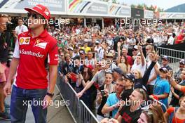 Fernando Alonso (ESP) Ferrari with the fans. 19.06.2014. Formula 1 World Championship, Rd 8, Austrian Grand Prix, Spielberg, Austria, Preparation Day.