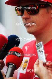 Kimi Raikkonen (FIN) Ferrari with the media. 19.06.2014. Formula 1 World Championship, Rd 8, Austrian Grand Prix, Spielberg, Austria, Preparation Day.