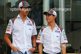 (L to R): Adrian Sutil (GER) Sauber with Esteban Gutierrez (MEX) Sauber. 19.06.2014. Formula 1 World Championship, Rd 8, Austrian Grand Prix, Spielberg, Austria, Preparation Day.