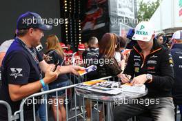 Nico Hulkenberg (GER) Sahara Force India F1 signs autographs for the fans. 19.06.2014. Formula 1 World Championship, Rd 8, Austrian Grand Prix, Spielberg, Austria, Preparation Day.