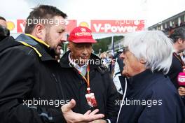 (L to R): Paul Hembery (GBR) Pirelli Motorsport Director with Niki Lauda (AUT) Mercedes Non-Executive Chairman and Bernie Ecclestone (GBR) on the grid. 24.08.2014. Formula 1 World Championship, Rd 12, Belgian Grand Prix, Spa Francorchamps, Belgium, Race Day.