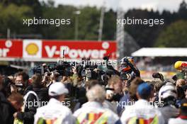 Race winner Daniel Ricciardo (AUS) Red Bull Racing celebrates in parc ferme. 24.08.2014. Formula 1 World Championship, Rd 12, Belgian Grand Prix, Spa Francorchamps, Belgium, Race Day.