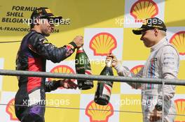 (L to R): Race winner Daniel Ricciardo (AUS) Red Bull Racing celebrates with third placed Valtteri Bottas (FIN) Williams. 24.08.2014. Formula 1 World Championship, Rd 12, Belgian Grand Prix, Spa Francorchamps, Belgium, Race Day.