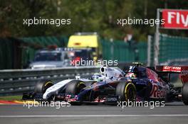Felipe Massa (BRA) Williams FW36 and Daniil Kvyat (RUS) Scuderia Toro Rosso STR9 battle for position. 24.08.2014. Formula 1 World Championship, Rd 12, Belgian Grand Prix, Spa Francorchamps, Belgium, Race Day.
