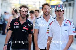 (L to R): Jean-Eric Vergne (FRA) Scuderia Toro Rosso with Jenson Button (GBR) McLaren and Adrian Sutil (GER) Sauber. 07.11.2014. Formula 1 World Championship, Rd 18, Brazilian Grand Prix, Sao Paulo, Brazil, Practice Day.