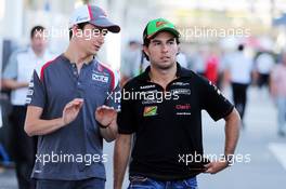 (L to R): Esteban Gutierrez (MEX) Sauber with Sergio Perez (MEX) Sahara Force India F1. 07.11.2014. Formula 1 World Championship, Rd 18, Brazilian Grand Prix, Sao Paulo, Brazil, Practice Day.