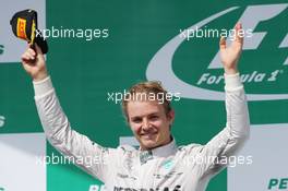 Race winner Nico Rosberg (GER) Mercedes AMG F1 celebrates on the podium. 09.11.2014. Formula 1 World Championship, Rd 18, Brazilian Grand Prix, Sao Paulo, Brazil, Race Day.