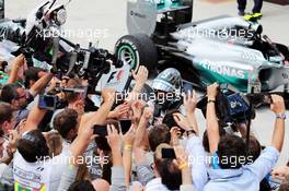 Race winner Nico Rosberg (GER) Mercedes AMG F1 celebrates in parc ferme. 09.11.2014. Formula 1 World Championship, Rd 18, Brazilian Grand Prix, Sao Paulo, Brazil, Race Day.