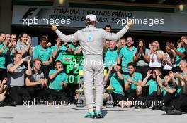 Race winner Nico Rosberg (GER) Mercedes AMG F1 celebrates with the team. 09.11.2014. Formula 1 World Championship, Rd 18, Brazilian Grand Prix, Sao Paulo, Brazil, Race Day.