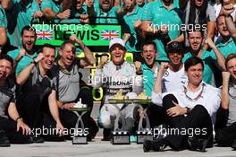 Race winner Nico Rosberg (GER) Mercedes AMG F1 celebrates with second placed Lewis Hamilton (GBR) Mercedes AMG F1 and the team. 09.11.2014. Formula 1 World Championship, Rd 18, Brazilian Grand Prix, Sao Paulo, Brazil, Race Day.