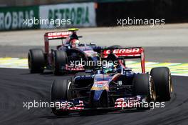 Jean-Eric Vergne (FRA) Scuderia Toro Rosso STR9 leads team mate Daniil Kvyat (RUS) Scuderia Toro Rosso STR9. 09.11.2014. Formula 1 World Championship, Rd 18, Brazilian Grand Prix, Sao Paulo, Brazil, Race Day.