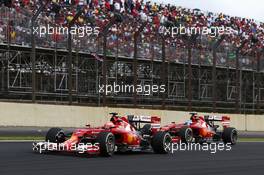 Kimi Raikkonen (FIN) leads Fernando Alonso (ESP) Ferrari F14-T. 09.11.2014. Formula 1 World Championship, Rd 18, Brazilian Grand Prix, Sao Paulo, Brazil, Race Day.
