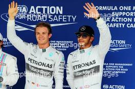 (L to R): Pole sitter Nico Rosberg (GER) Mercedes AMG F1 with second placed team mate Lewis Hamilton (GBR) Mercedes AMG F1 in parc ferme. 08.11.2014. Formula 1 World Championship, Rd 18, Brazilian Grand Prix, Sao Paulo, Brazil, Qualifying Day.