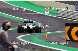 Lewis Hamilton (GBR) Mercedes AMG F1 W05 enters the new pit lane. 08.11.2014. Formula 1 World Championship, Rd 18, Brazilian Grand Prix, Sao Paulo, Brazil, Qualifying Day.
