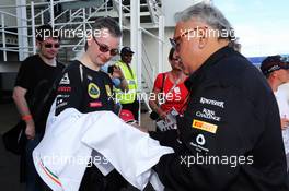 Dr. Vijay Mallya (IND) Sahara Force India F1 Team Owner signs autographs for the fans. 04.07.2014. Formula 1 World Championship, Rd 9, British Grand Prix, Silverstone, England, Practice Day.