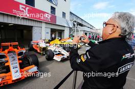 Dr. Vijay Mallya (IND) Sahara Force India F1 Team Owner with a collection of old Sahara Force India F1 Team cars. 04.07.2014. Formula 1 World Championship, Rd 9, British Grand Prix, Silverstone, England, Practice Day.