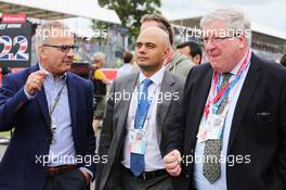 The Rt Hon Sajid Javid MP (GBR) Secretary of State for Culture, Media and Sport and Minister for Equalities (Centre) on the grid. 06.07.2014. Formula 1 World Championship, Rd 9, British Grand Prix, Silverstone, England, Race Day.