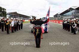 A band play on the grid. 06.07.2014. Formula 1 World Championship, Rd 9, British Grand Prix, Silverstone, England, Race Day.