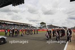 A band play on the grid. 06.07.2014. Formula 1 World Championship, Rd 9, British Grand Prix, Silverstone, England, Race Day.
