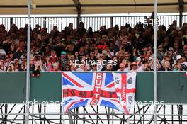 Banners by fans for Lewis Hamilton (GBR) Mercedes AMG F1 and Jenson Button (GBR) McLaren. 06.07.2014. Formula 1 World Championship, Rd 9, British Grand Prix, Silverstone, England, Race Day.