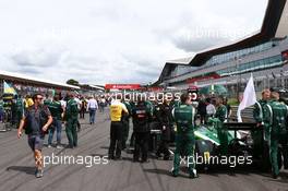 Kamui Kobayashi (JPN) Caterham CT05 on the grid. 06.07.2014. Formula 1 World Championship, Rd 9, British Grand Prix, Silverstone, England, Race Day.