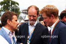 (L to R): Mark Stewart (GBR) with HRH Prince Harry (GBR) on the grid. 06.07.2014. Formula 1 World Championship, Rd 9, British Grand Prix, Silverstone, England, Race Day.