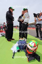 Sergio Perez (MEX) Sahara Force India F1 on the grid. 06.07.2014. Formula 1 World Championship, Rd 9, British Grand Prix, Silverstone, England, Race Day.