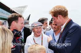 (L to R): Christian Horner (GBR) Red Bull Racing Team Principal with Jackie Stewart (GBR); Mark Stewart (GBR); and HRH Prince Harry (GBR) on the grid. 06.07.2014. Formula 1 World Championship, Rd 9, British Grand Prix, Silverstone, England, Race Day.