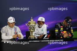 The post race FIA Press Conference (L to R): Nico Rosberg (GER) Mercedes AMG F1, second; Lewis Hamilton (GBR) Mercedes AMG F1, race winner; Daniel Ricciardo (AUS) Red Bull Racing, third. 06.07.2014. Formula 1 World Championship, Rd 9, British Grand Prix, Silverstone, England, Race Day.