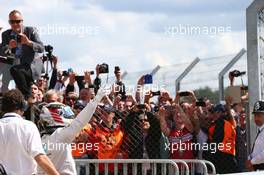 Race winner Lewis Hamilton (GBR) Mercedes AMG F1 celebrates in parc ferme. 06.07.2014. Formula 1 World Championship, Rd 9, British Grand Prix, Silverstone, England, Race Day.