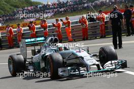 Rw Lewis Hamilton (GBR) Mercedes AMG F1 W05 enters parc ferme. 06.07.2014. Formula 1 World Championship, Rd 9, British Grand Prix, Silverstone, England, Race Day.