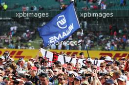 Fans invade the circuit after the race. 06.07.2014. Formula 1 World Championship, Rd 9, British Grand Prix, Silverstone, England, Race Day.