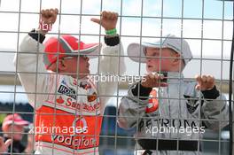 Young McLaren and Mercedes AMG F1 fans. 06.07.2014. Formula 1 World Championship, Rd 9, British Grand Prix, Silverstone, England, Race Day.
