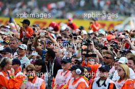 Fans invade the circuit after the race. 06.07.2014. Formula 1 World Championship, Rd 9, British Grand Prix, Silverstone, England, Race Day.