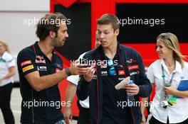 (L to R): Jean-Eric Vergne (FRA) Scuderia Toro Rosso with team mate Daniil Kvyat (RUS) Scuderia Toro Rosso. 03.07.2014. Formula 1 World Championship, Rd 9, British Grand Prix, Silverstone, England, Preparation Day.
