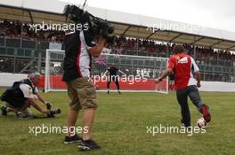 Fernando Alonso (ESP) Ferrari takes a penalty kick. 03.07.2014. Formula 1 World Championship, Rd 9, British Grand Prix, Silverstone, England, Preparation Day.