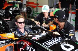 (L to R): Nico Hulkenberg (GER) Sahara Force India F1 and Sergio Perez (MEX) Sahara Force India F1 with Ricky Wilson (GBR) Kaiser Chiefs Lead Singer, in the Sahara Force India F1 VJM07. 03.07.2014. Formula 1 World Championship, Rd 9, British Grand Prix, Silverstone, England, Preparation Day.